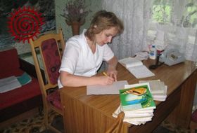 A primary care provider catching up on the medical records for the day. Photo taken by the author at a provincial health care facility. Image by the author, 2008.