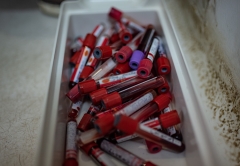A box full of vials. Photo by Olivia Acland, 2018.
